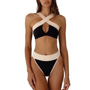 Kya reversible black/bone size medium NWT